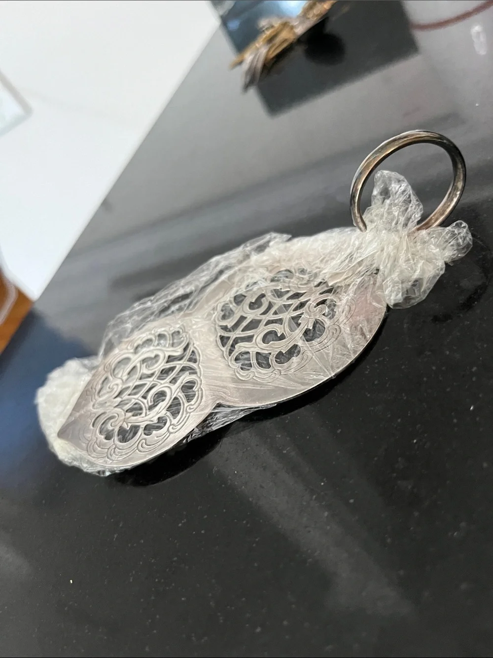 Vintage silver-plated cake server with finger loop.